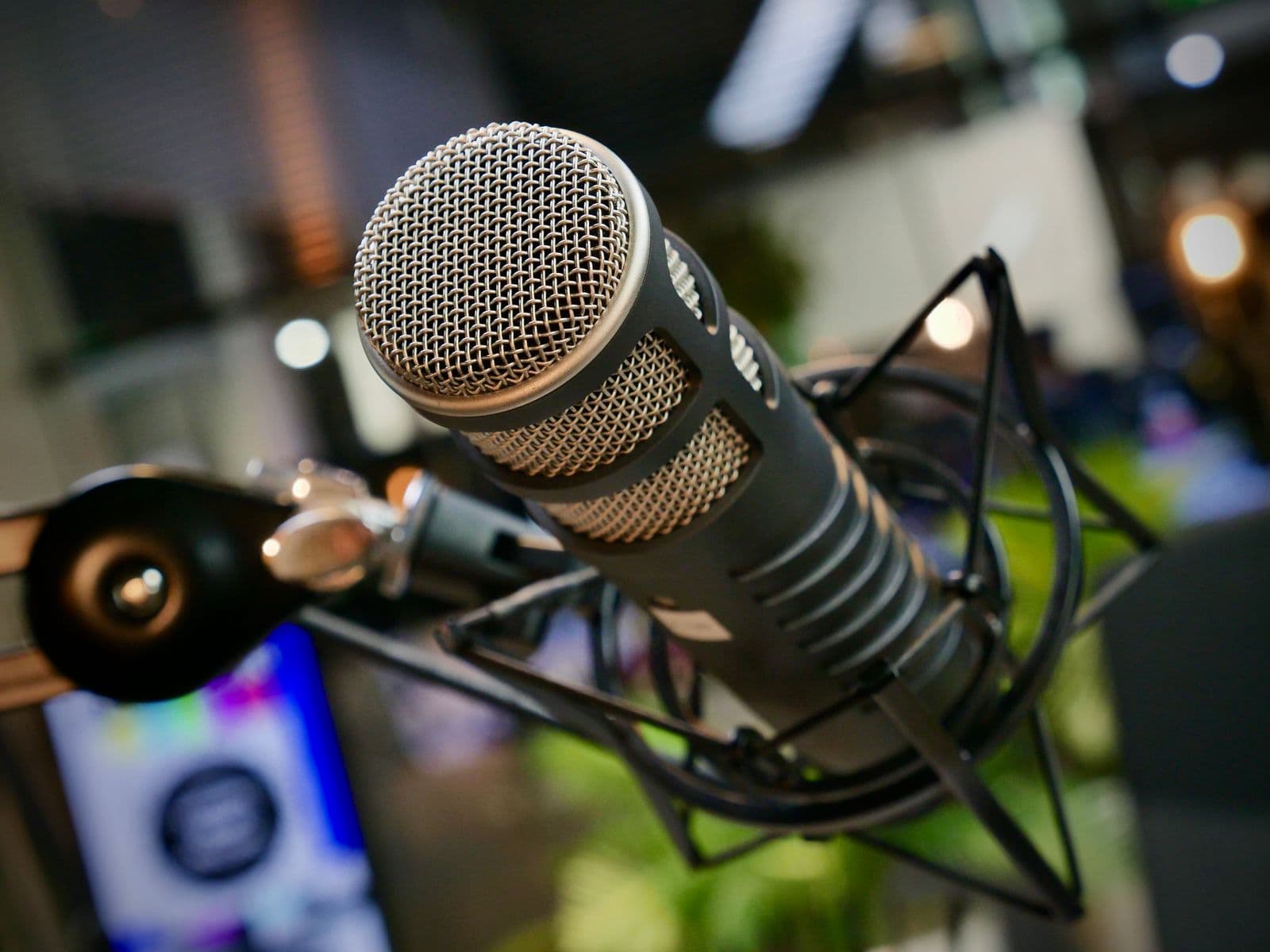 Broadcast microphone on a boom arm in a recording studio